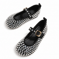 Black Mary Jane flats covered in clear rhinestones
