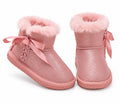 Pink glitter ankle boots with fluffy fur cuffs and satin bows